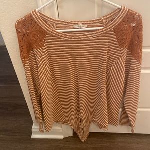 A burnt orange Maurices top